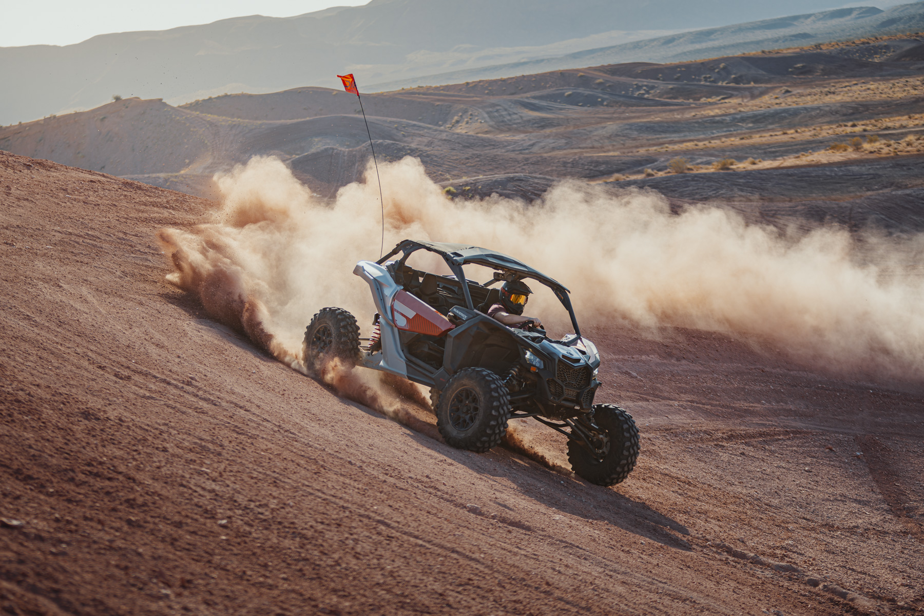 UTV drifting on Sand Hollow’s purple hills during high-speed off-road adventure tour with Southern Utah Adventure Center rentals